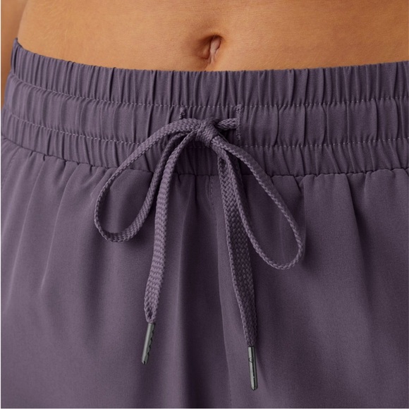 Halara purple midrise flowy, two in one running shorts, medium, new - Picture 5 of 11